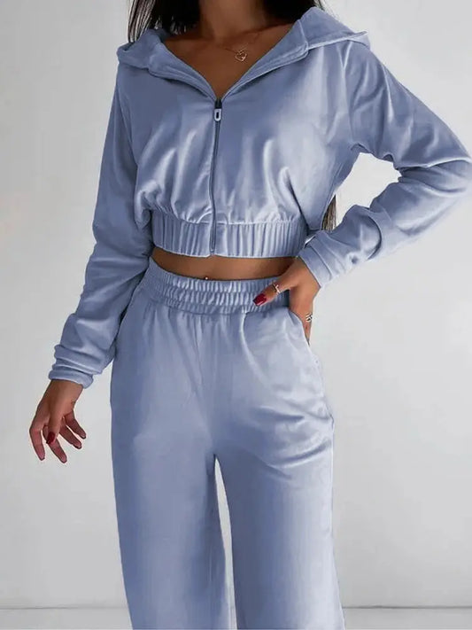 "Completo sportivo Donna celeste con zip e vita elasticizzata" All You Need