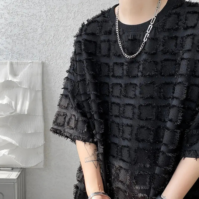 "T-shirt oversize nera con texture geometrica in rilievo" All You Need
