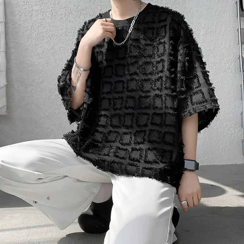 "T-shirt oversize nera con texture geometrica in rilievo" All You Need