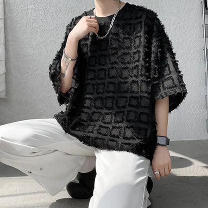 "T-shirt oversize nera con texture geometrica in rilievo" All You Need