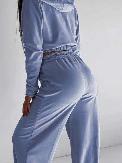 "Completo sportivo Donna celeste con zip e vita elasticizzata" All You Need