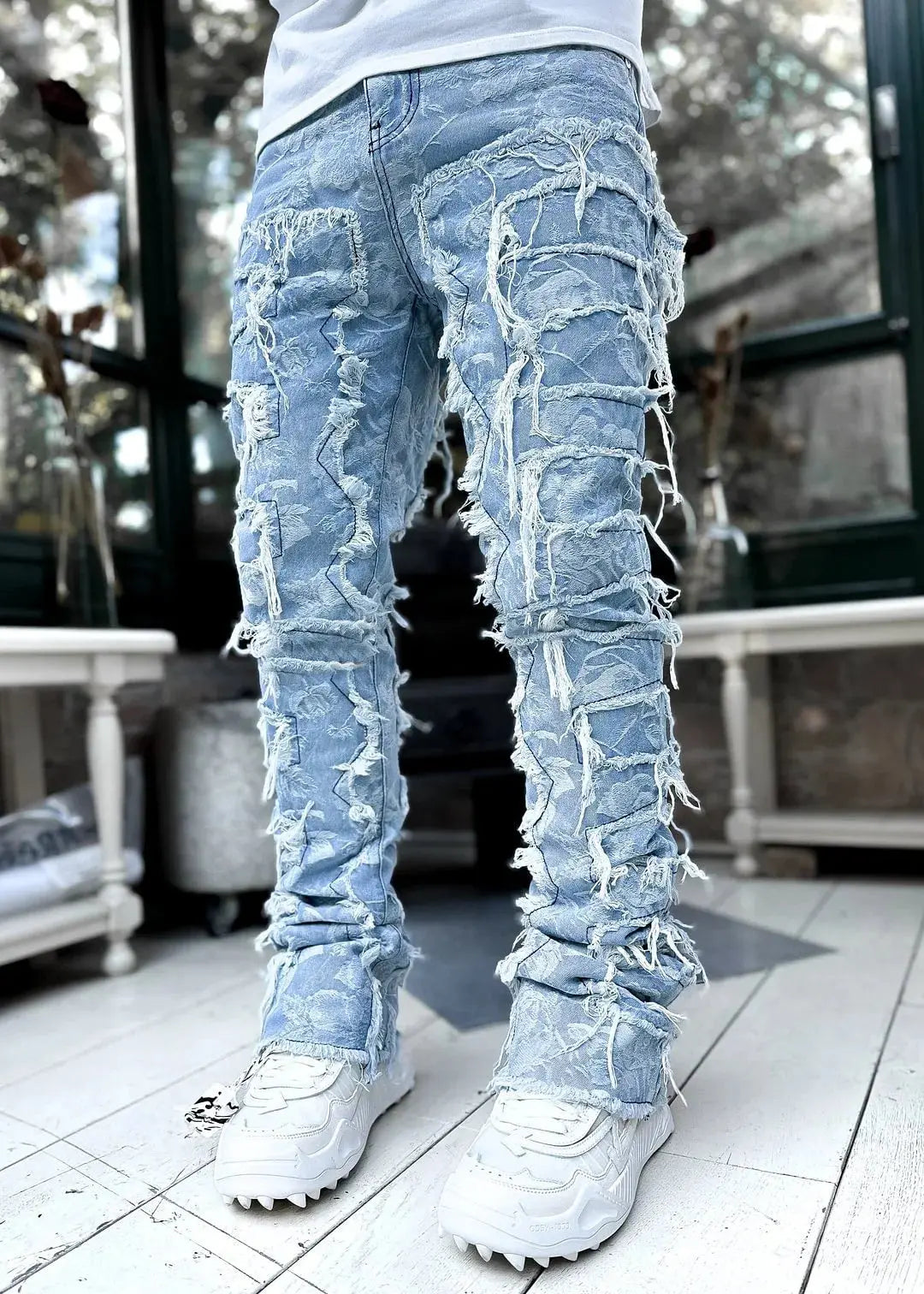 "Jeans uomo azzurri strappati con dettagli distressed" All You Need