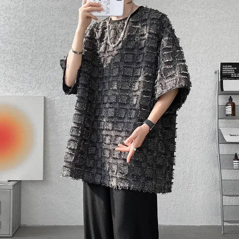 "T-shirt oversize nera con texture geometrica in rilievo" All You Need