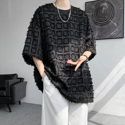 "T-shirt oversize nera con texture geometrica in rilievo" All You Need