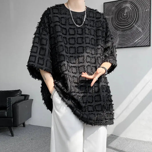 "T-shirt oversize nera con texture geometrica in rilievo" All You Need