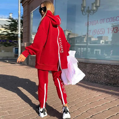 "Completo sportivo donna nero con dettagli bianchi e sneakers chunky" All You Need