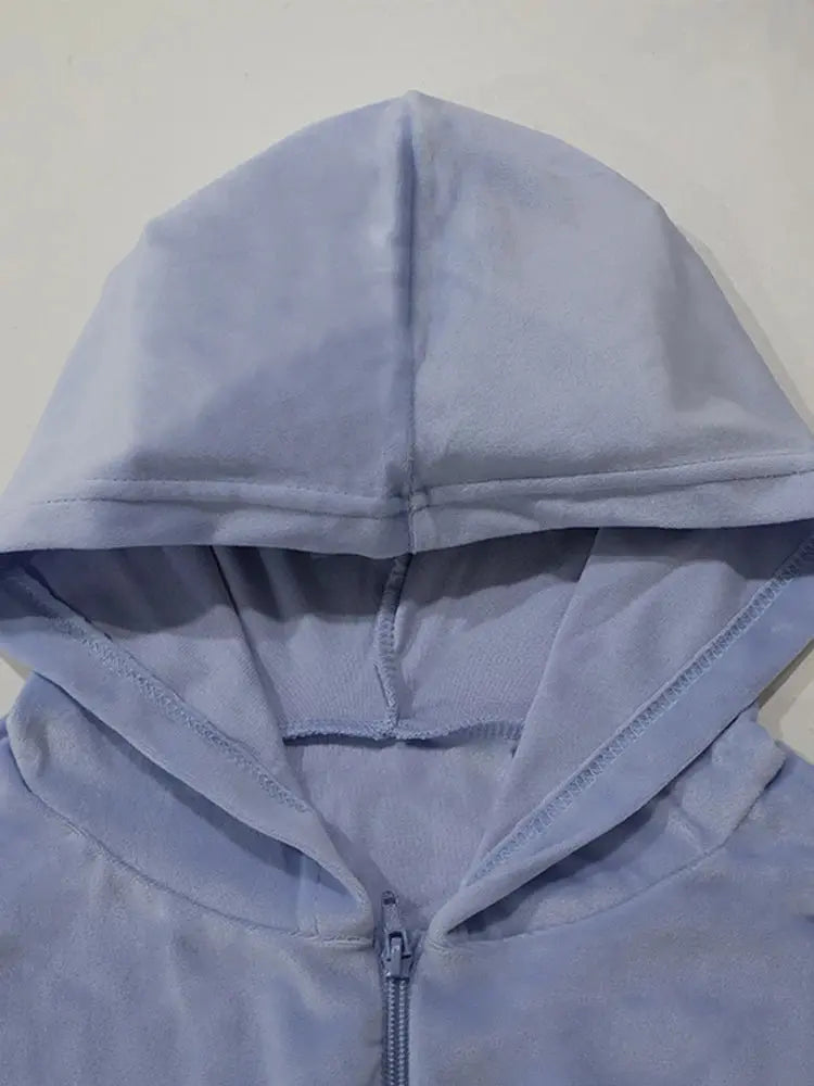 "Completo sportivo Donna celeste con zip e vita elasticizzata" All You Need