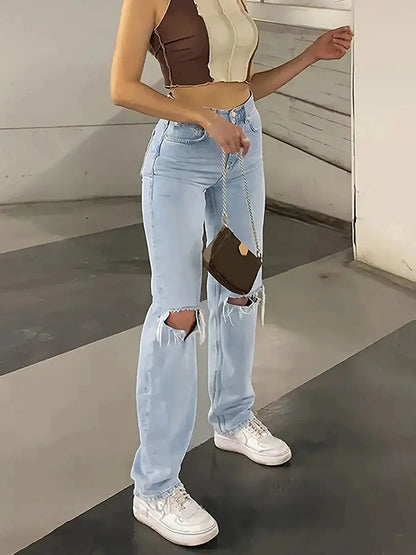 "Jeans a vita alta strappati al ginocchio in denim chiaro" 👖 All You Need