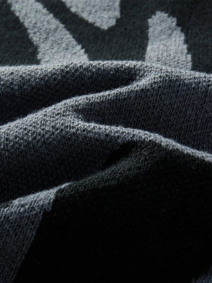 Maglione grigio con pattern astratto nero" 🖤 All You Need
