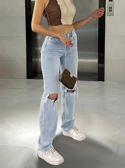 "Jeans a vita alta strappati al ginocchio in denim chiaro" 👖 All You Need