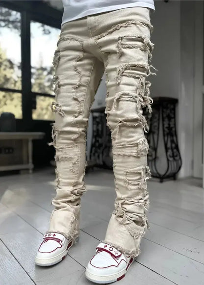 "Jeans uomo azzurri strappati con dettagli distressed" All You Need